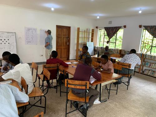 teacher in tanzania classroom
